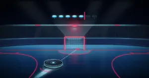 Futuristinen jäähalli, jossa hohtava kiekko liukuu pisteviivaa pitkin kohti punaisena hehkuvaa maalia ja maalin yläpuolella leijuva hologrammi näyttää viisi syttynyttä kiekkoa ja punaisen rajaviivan maalimäärän yli/ali-vedon havainnollistamiseksi.